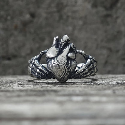 Gothic Skull Hands Holding Heart Sterling Silver Ring