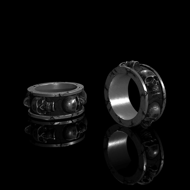 Skulls Surrounded Sterling Silver Ring
